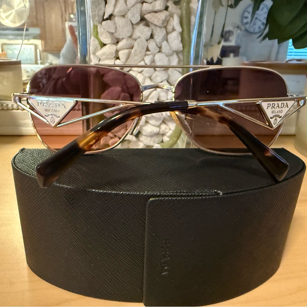 Celebrity-Owned Prada Sunglasses - Picture 2 of 6